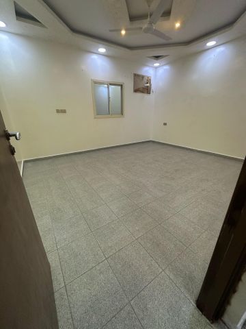 Flat for rent at Hamad Town roundabout 9 near highway  4