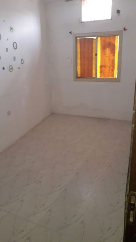 Semi furnished flat for rent at Ras Rumman 